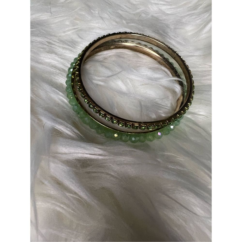Set of 2 gold and green bangles